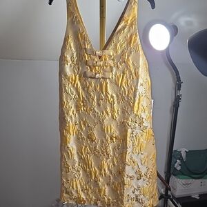 Yellow Textured V-Neck Mini Dress with Decorative Front Tabs